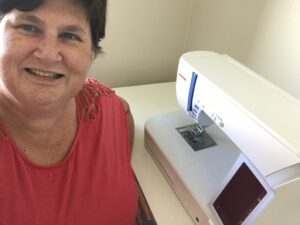 Sewing plus size clothing.  Helen at her sewing machine.