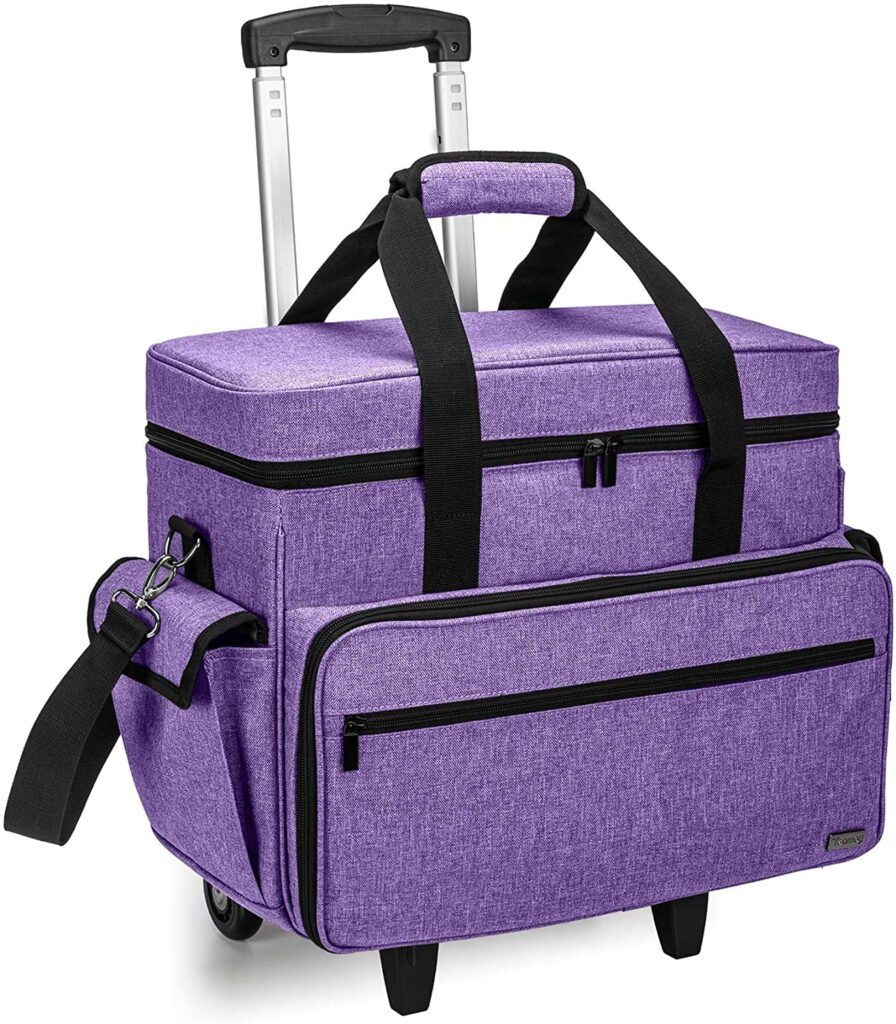 A purple sewing machine trolley bag with lots of external pockets.